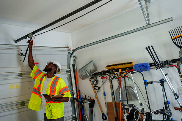 Professional Garage Door Panel Replacement technician working in Center Point, IA
